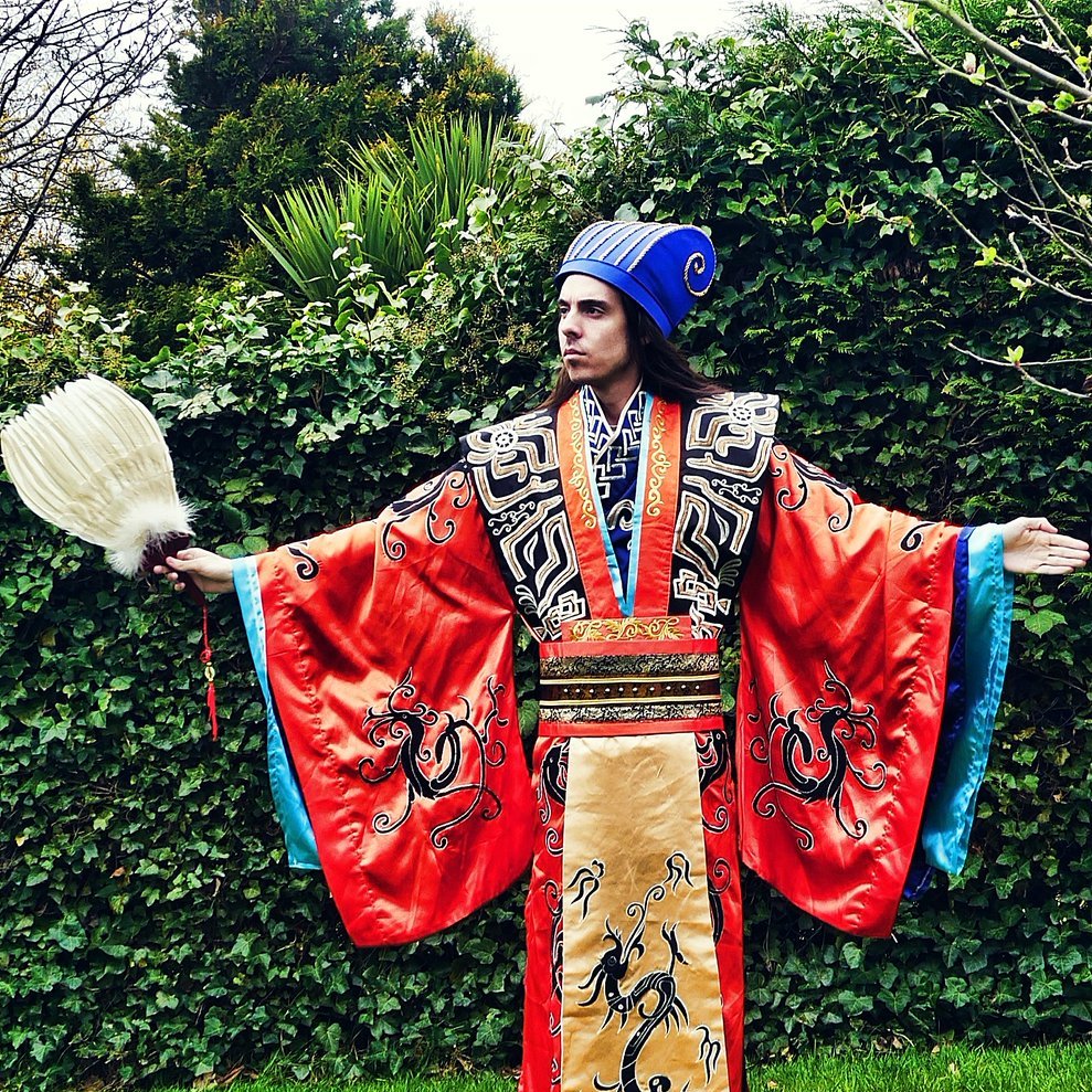 If fashion is a problem for you, just wear something simple like exercise pants and a tanktop. Then buy a lot of textiles and silk ornate fabrics and pile them around yourself like you're a flaming Indian prince or you own an art gallery. Get yourself a pair of eskimo sunglasses.