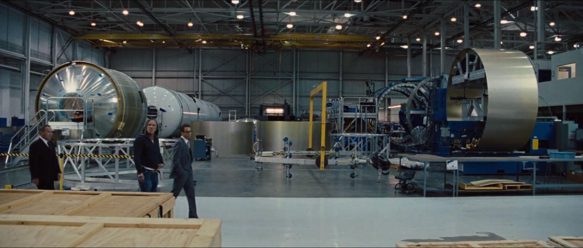 Fun fact: During the production of Iron Man 2, <a href="/elonmusk/">Elon Musk</a> let the Crew film in the SpaceX facility. 

The "Big Metal Tube" in the background of the Hammer Industries factory is actually a Falcon 9 Rocket and the workers in the background are real employees of SpaceX.