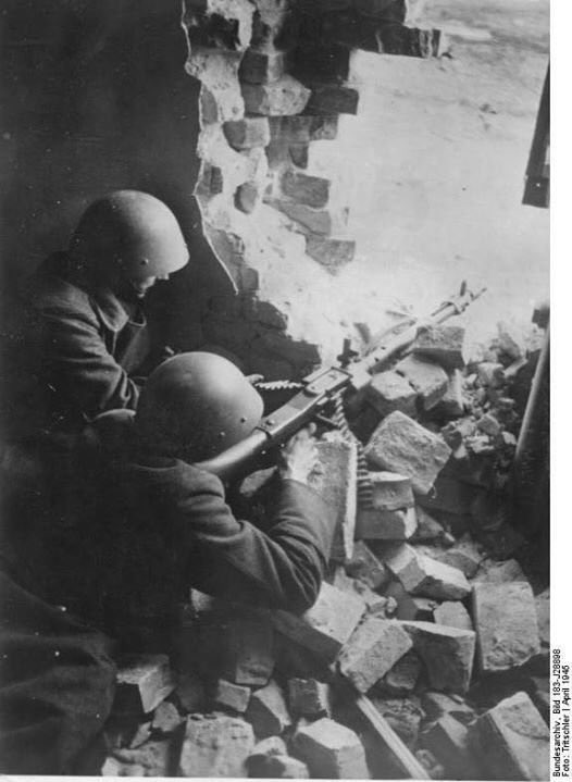 Eisenhüttenwerke, Thale - one of the influential & largest producers of Stahlhelm produced a small number, incl the model B, which were used by some Volkssturm/Hitler-Jugend units near the factory. Here is the only photo I’ve seen of the B in use, differing from the B2. 13)