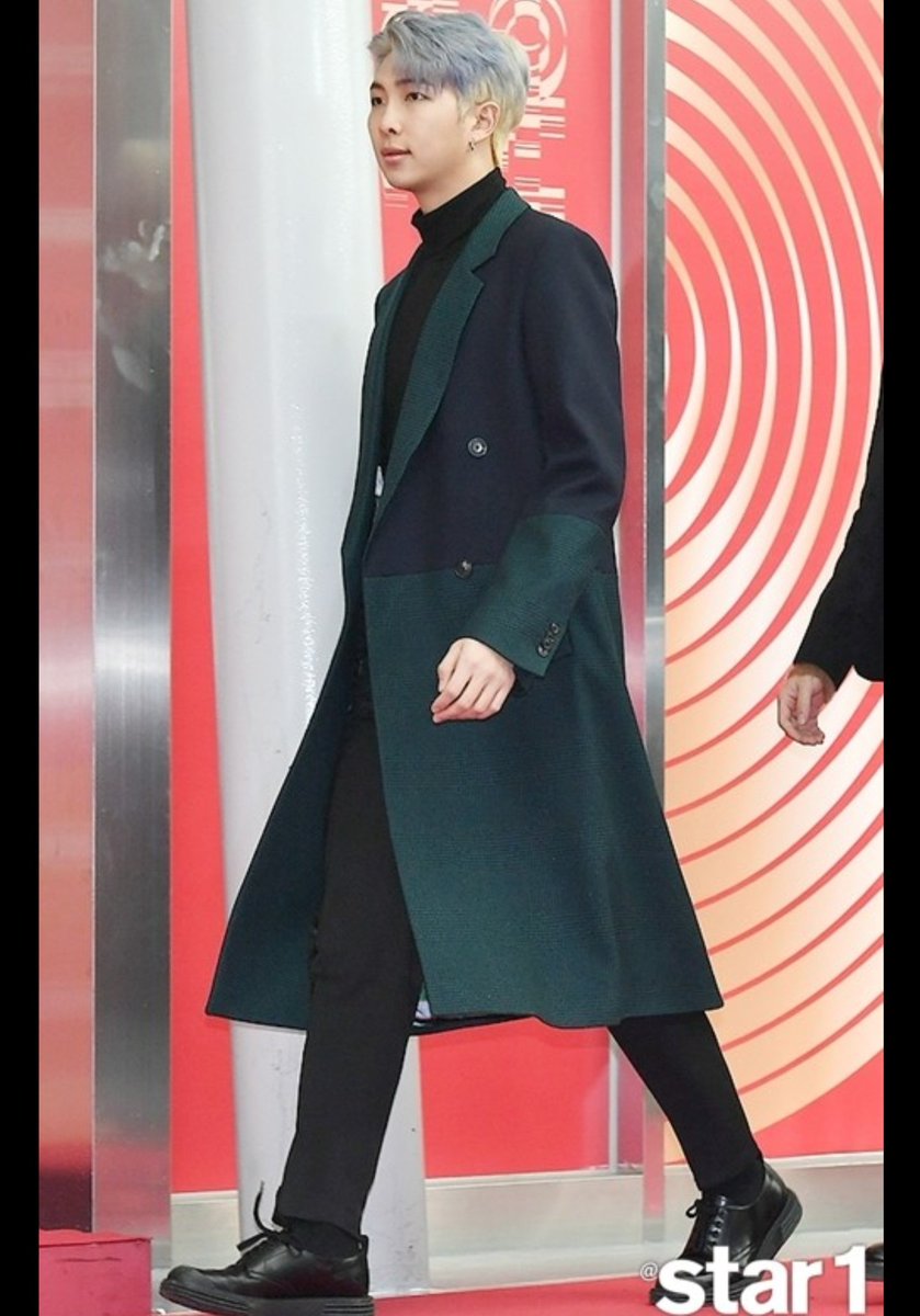 A red carpet look just isn't complete without a long trenchcoat or suit jacket