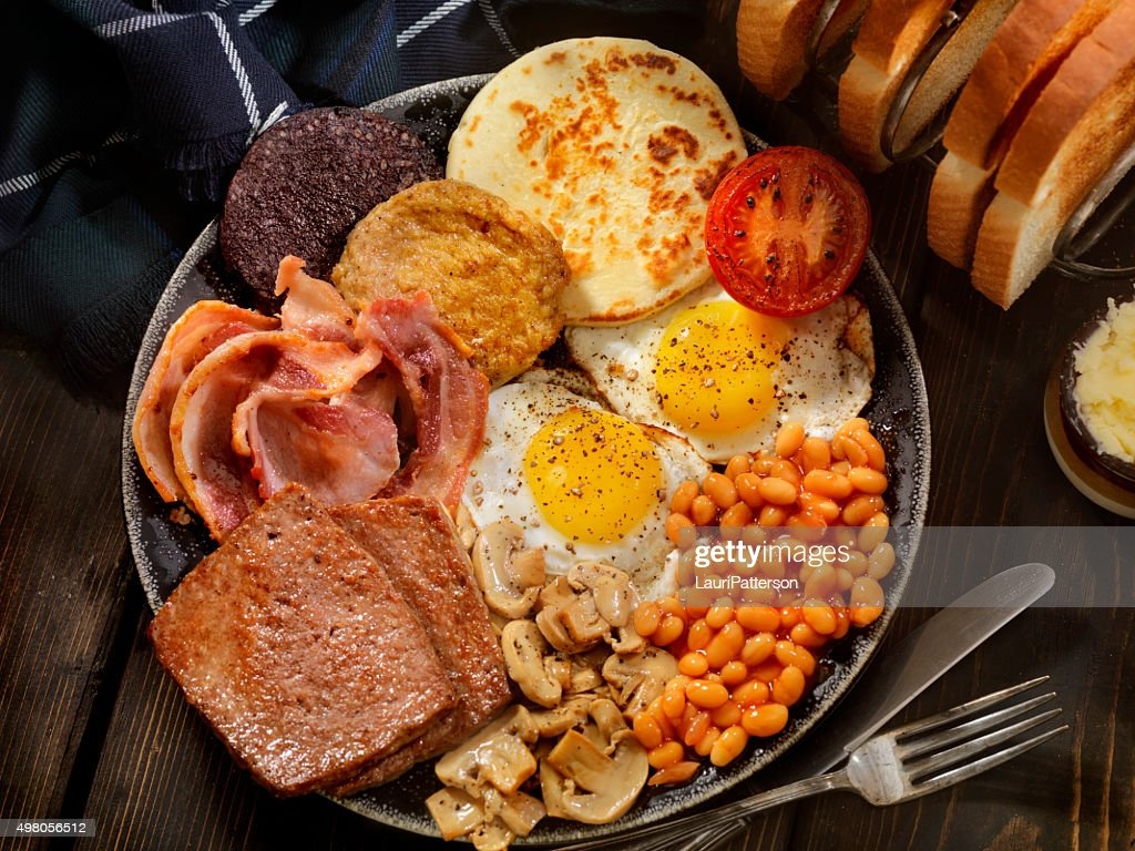 WryNolan's tweet photo. @stone_heather_ Angus squirms happily as he watches Tom set out the toast, butter, eggs, tomatoes, beans, potato tatties, pancakes, bacon, sausage, and orange juice. "We're fast asleep, having the loveliest dream together. Happy Christmas, Mrs Nolan." Before he sits he brings her three packages. https://t.co/sfoJ7pKw0l