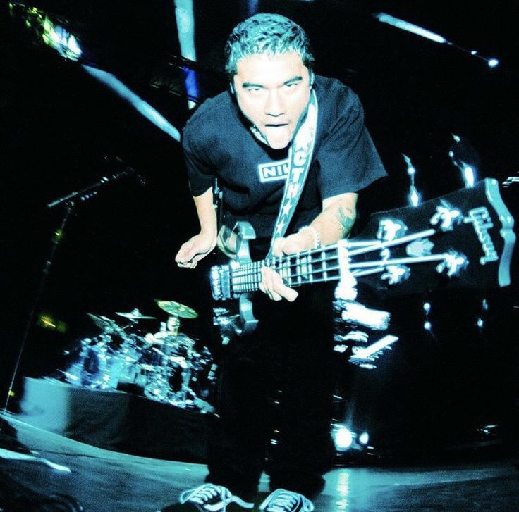 a thread of calum with his tongue out