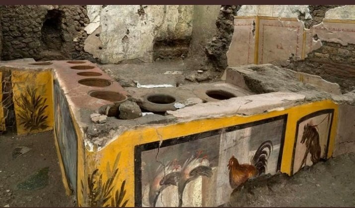 From right to left on the mural;A dog - possibly for protection of owner, from pests to robbers. A cockrel - just like we eat chicken today. Geese - we eat goose, we wrap our xmas tatties in its fats. Vegetation - plant matter on the corner mural could suggest herbs...