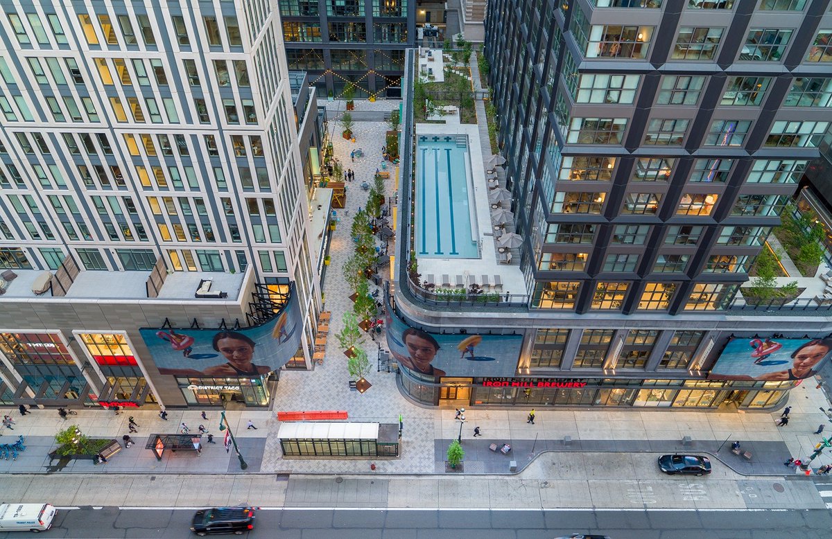 The other useful strategy is to have a design review committee that actually focuses on the pedestrian interface (instead of facades!) Encouraging through-block connections and multiple buildings can make the largest developments feel more palatable