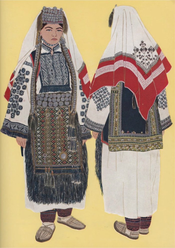 A married woman’s costume has most of these elements, but with a few distinctions. Coins are taken out of the braids. The silver jewelry is not worn; this would have been because women of a certain age would have passed them to their daughters by then. (two girls of marrying age)