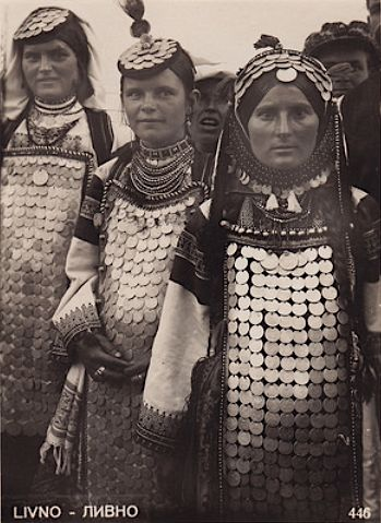 Gerdan – a long apron covered in silver, representing a girls dowry; worn on special, public occasionsPafte – silver belt buckle, ornately engraved, and with a pointed central point. Plants and birds are common on pafte. (From Serbian women in Sarajevo, 19th century)