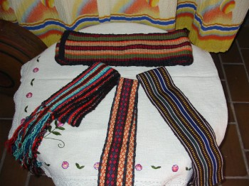 Pojas (belt) – a woolen sash woven on a small heddle loom (coins, typically Austro-Hungarian, would be sewn to the belt for unmarried women)Zubun – waist or hip length open vest/jacket made from wool, made in white or black/dark blue symbolizing the marital status of a woman.