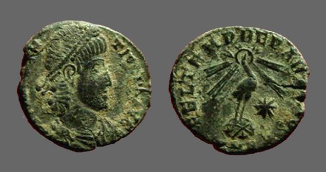 A coin of Constantius, a son of Constantine. It a phoenix, standing on top of the orb and X. The phoenix was used as a symbol of Roman revival. The last century hadn't been good for the empire, but after that was even worse.