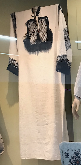 Haljina (dress) – a heavy woolen garment that has long sleeves and a bodice like a coat, but a wider skirt.Kapa (hat) – a shallow, red felt cap decorated with silver coins.Đerdan – a necklace of silver coins (not from Bosanska Krajina, just an example on a Serbian woman)