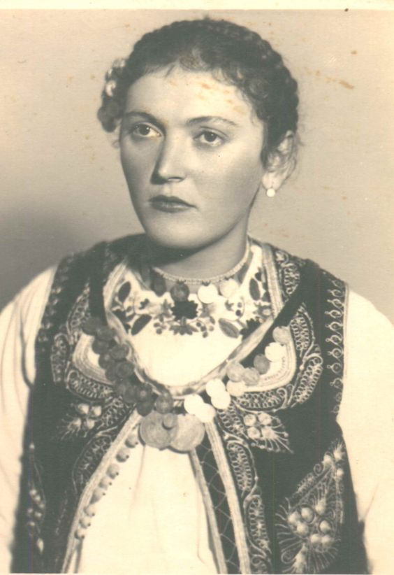 Haljina (dress) – a heavy woolen garment that has long sleeves and a bodice like a coat, but a wider skirt.Kapa (hat) – a shallow, red felt cap decorated with silver coins.Đerdan – a necklace of silver coins (not from Bosanska Krajina, just an example on a Serbian woman)