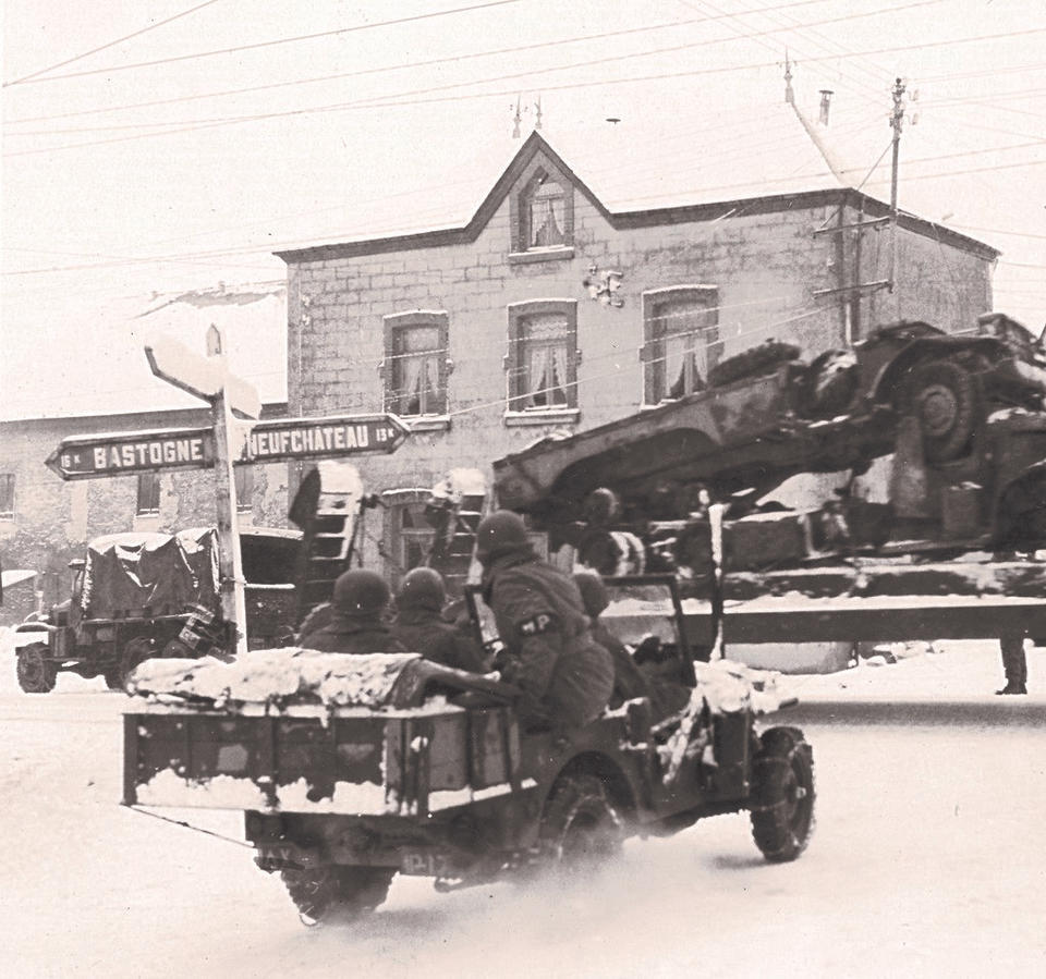 They came to a sign that read Neufchateau and Bastogne. The 8th Tank Battalion had about 32 tanks, and they reached the outskirts of Bastogne, having traveled over 160 miles in less than 24 hours.