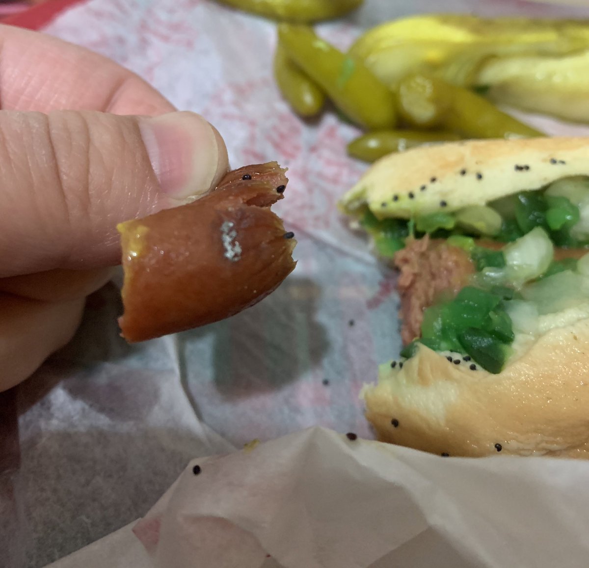 Otterss321_'s tweet photo. Was excited to get @portilloshotdog ‘s today and when I bit into my hot dog, I noticed there was a piece of metal/something metallic on various parts of my hot dog.. 🤢🤢🤮 #letdown #grossedout https://t.co/fIAr7omA6O