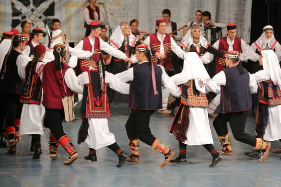 and a koporan which is a distinctive military-style short shirt with sleeves. Men typically wore a pair of linen pants underneath an external pair of wider woolen pants. The costume was tied together with a pojas.(costumes from Zmijanje) (costumes from Drvar ,Western Bosnia)