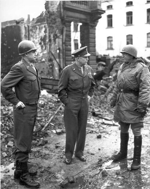 [7 of 8]By the morning of December 27, 1944, the Master of War; Patton, Eisenhower, Bradley, Ridgway, Montgomery, Collins; were planning a massive attack from both the North and the South to pinch off the bulge and break the enemy's will.