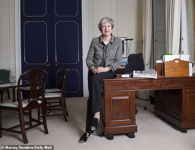 Theresa May liked to sit on that very same desk that Boris and Blair put their feet on.