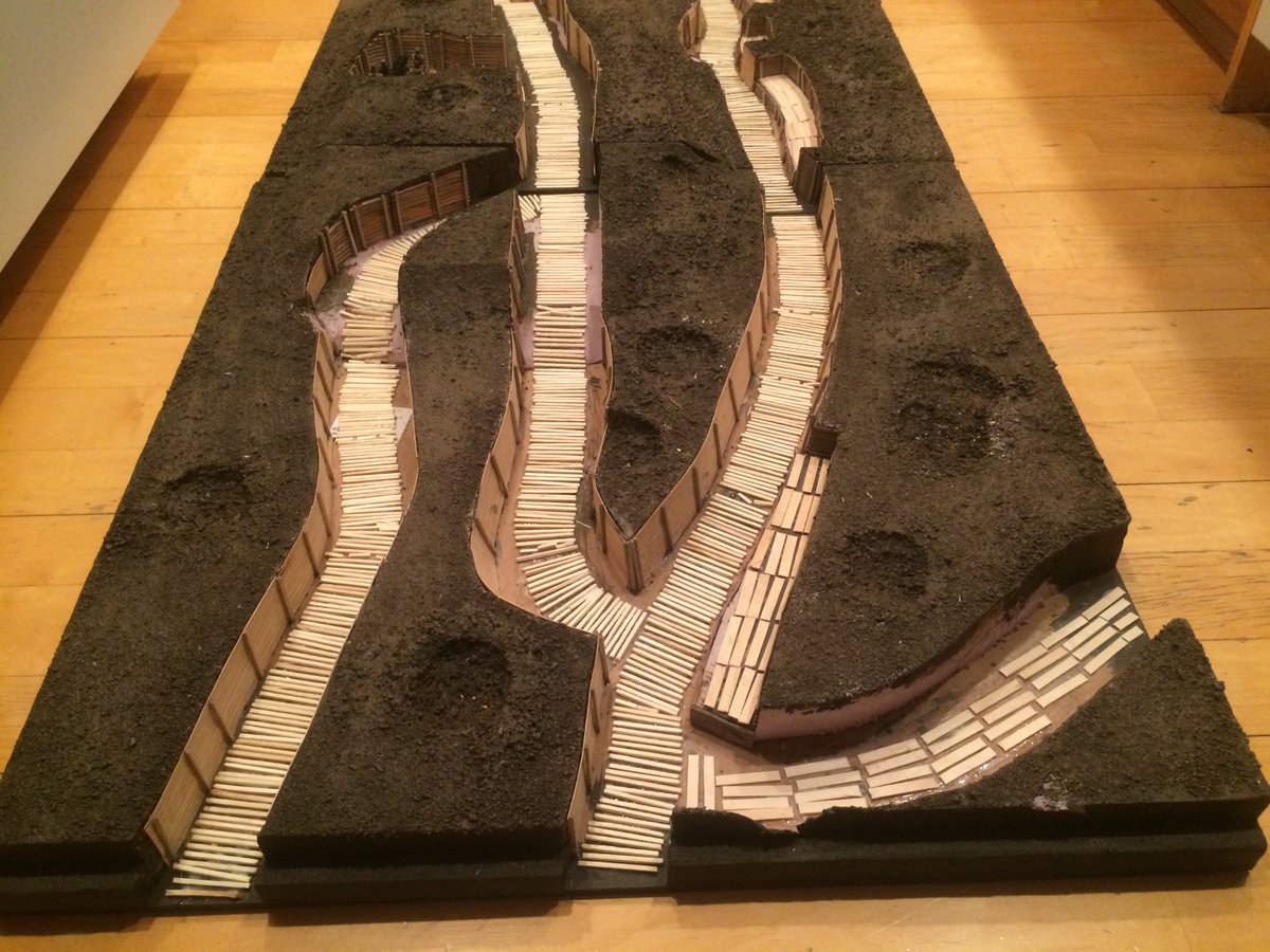 Bamboo mat as duckboards, I know it's not really what they look like but tie was running out. I also used coffee stir stick in places. I cut matchsticks to be used as posts holding up the trench walls. There were several coats of drybrush lighter colored brown paint applied.