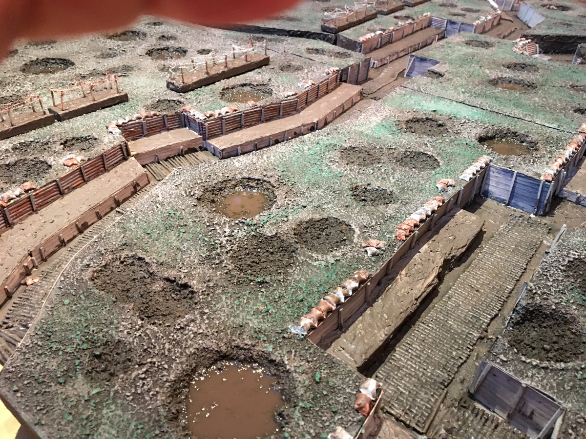 I built the pillbox out of a cardboard tube. This sat up on hill 145. A also used clear water acrylic mixed with brown house paint to make the shell hole puddles.