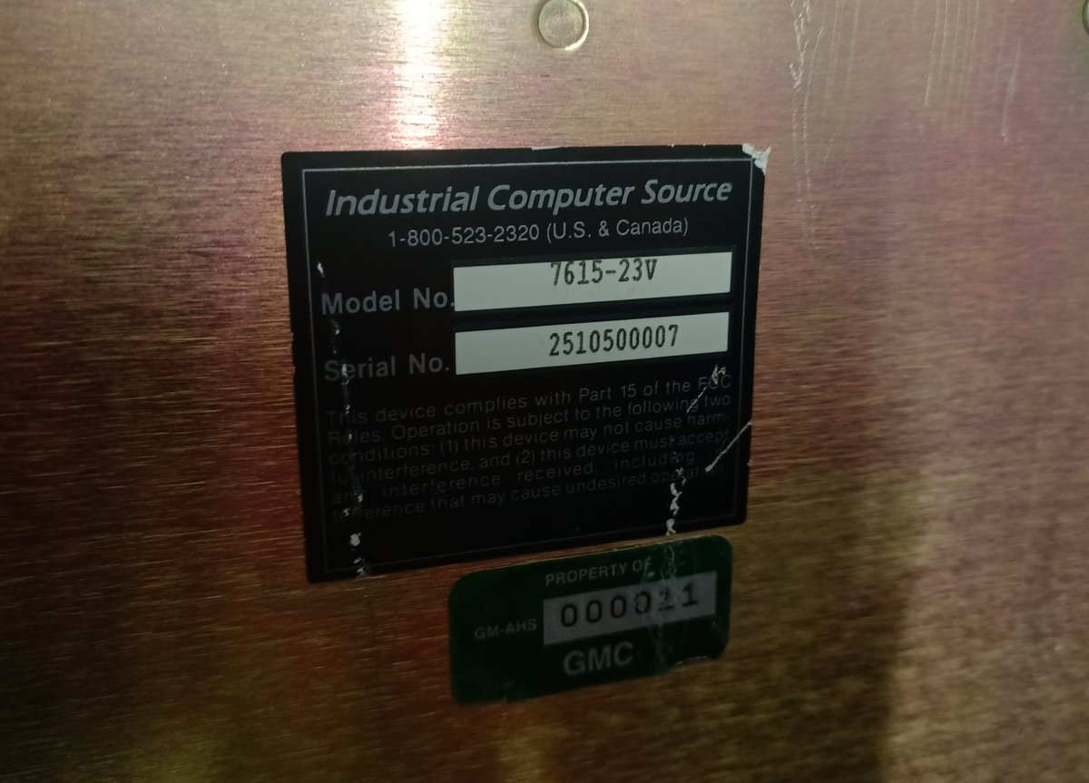 It's apparntly the 7615-23V from Industrial Computer Source.Property of GMC... Is that the General Motors Truck Company?