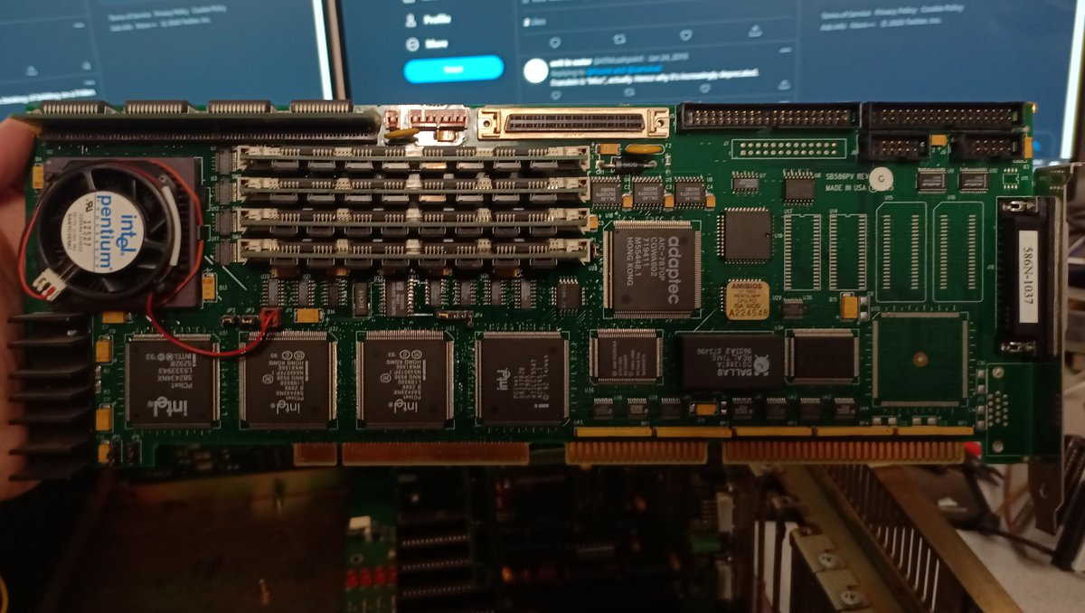 So let's pull out the first card.It's indeed an SBC! It's got ISA and PCI buses, though this backplane only uses the ISA. It's a pentium, apparently. Looks like it's got SCSI, IDE, Floppy, and serial onboard.
