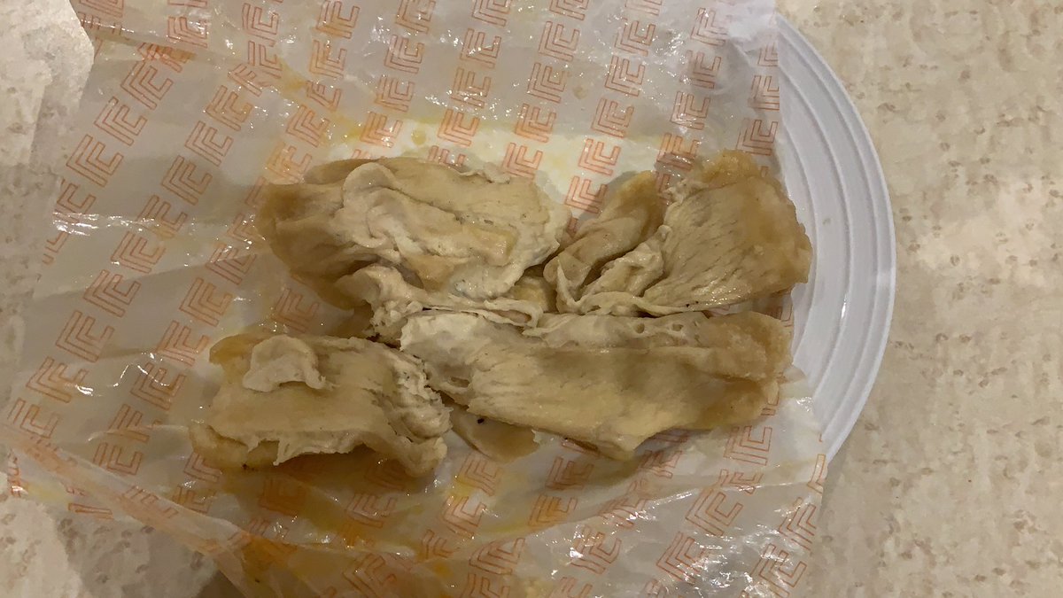 JeffBilek's tweet photo. I thought crazy bread was supposed to be cooked before its sold. I got a pile of dough and grease..... @littlecaesars https://t.co/9TwkHuT4aq