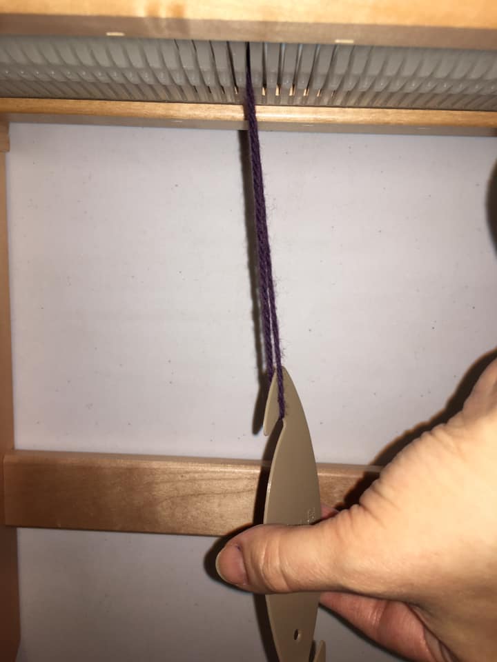 9/ Then you pull it through the reed with this little hook