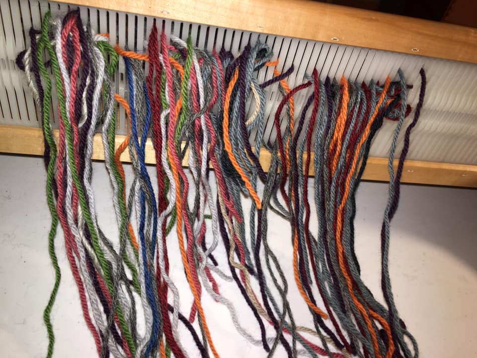 18/ You wind until 3/4 of the yarn is on the loom