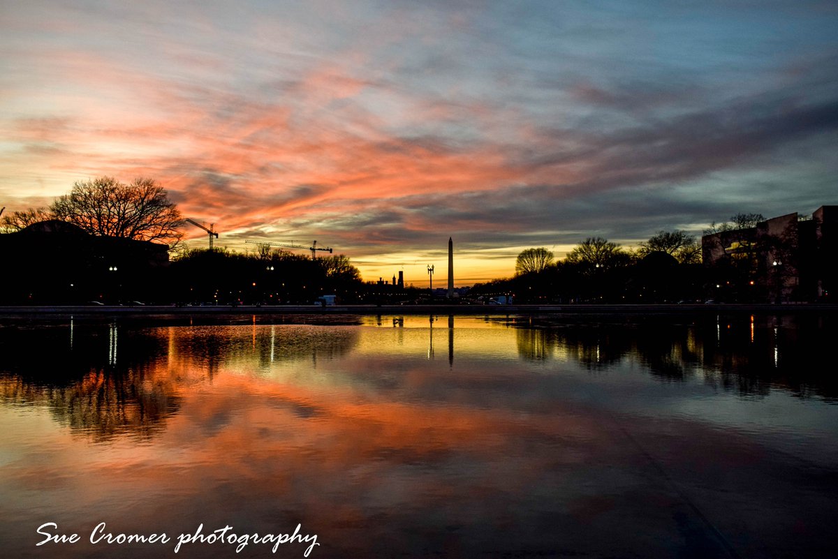 SueCromer's tweet photo. I went to photograph the Capitol Christmas tree and was treated to an incredible sunset in DC. This is the #CapitolReflectingPool looking West toward the #WashingtonMonument The monument looks a bit small in the distance. @capitalweather @amelia_draper @nbcwashington https://t.co/qzIkVbVJto