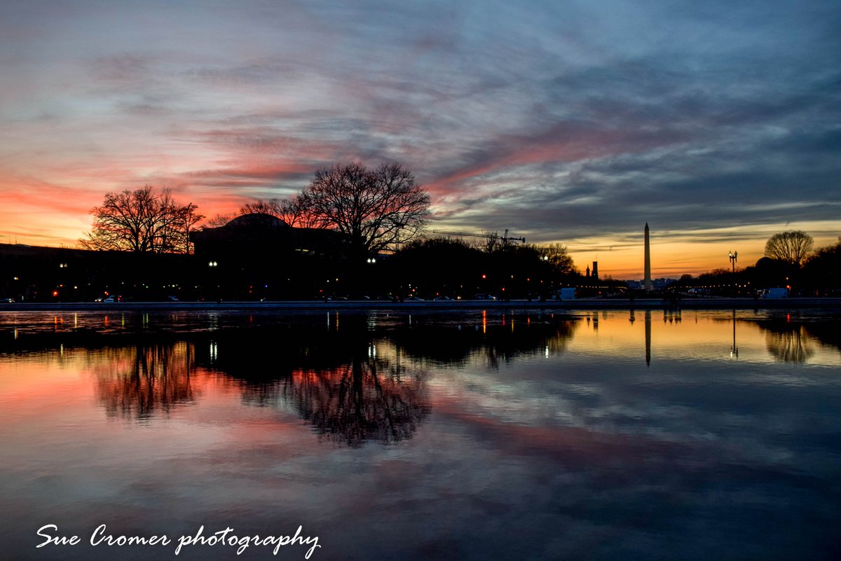 SueCromer's tweet photo. I went to photograph the Capitol Christmas tree and was treated to an incredible sunset in DC. This is the #CapitolReflectingPool looking West toward the #WashingtonMonument The monument looks a bit small in the distance. @capitalweather @amelia_draper @nbcwashington https://t.co/qzIkVbVJto
