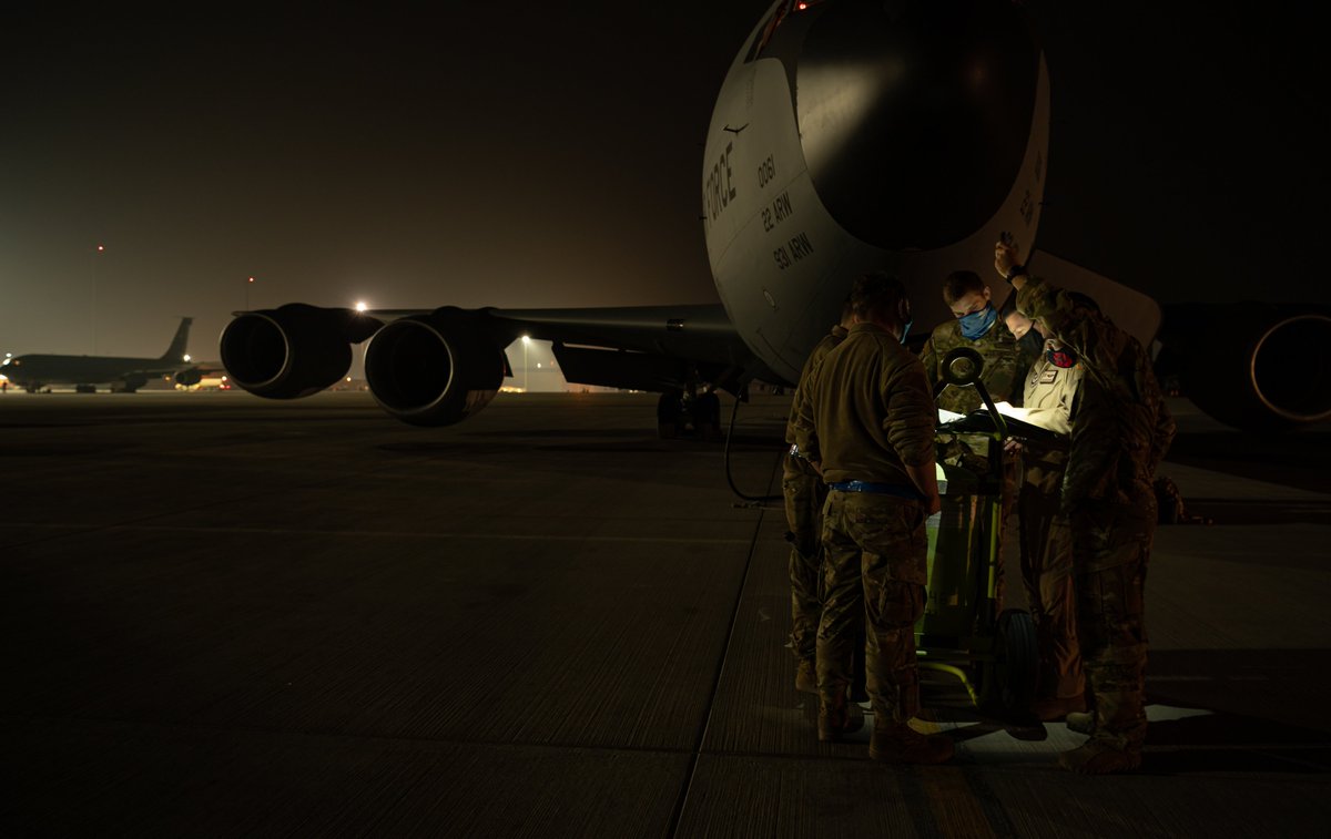 A U.S. Air Force KC-135 Stratotanker crew, assigned to the 50th Expeditionary Aircraft Refueling Squadron, performs pre-flight checks before an aerial refueling mission at Al Udeid Air Base, Qatar, Dec. 22, 2020.