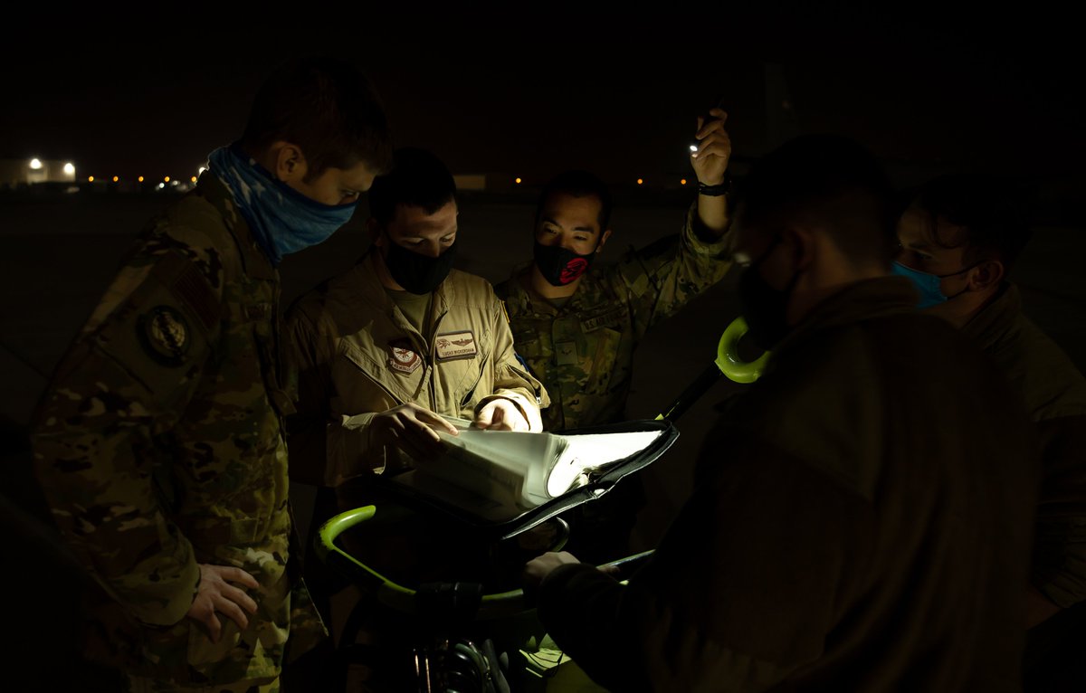 A U.S. Air Force KC-135 Stratotanker crew, assigned to the 50th Expeditionary Aircraft Refueling Squadron, performs pre-flight checks before an aerial refueling mission at Al Udeid Air Base, Qatar, Dec. 22, 2020.