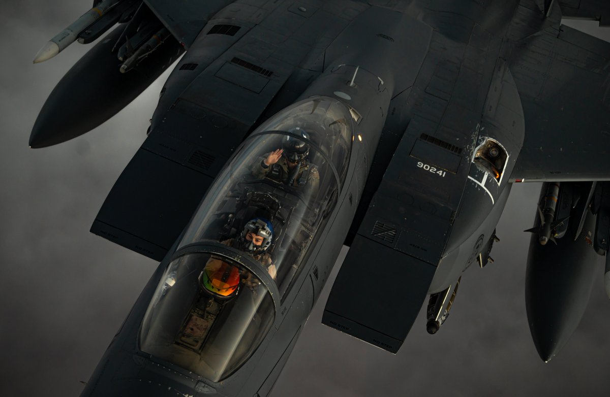 A U.S. Air Force F-15E Strike Eagle departs after receiving fuel from a U.S. Air Force KC-135 Stratotanker, assigned to the 50th Expeditionary Aircraft Refueling Squadron, during an air refueling mission over Southwest Asia, Dec. 22, 2020.