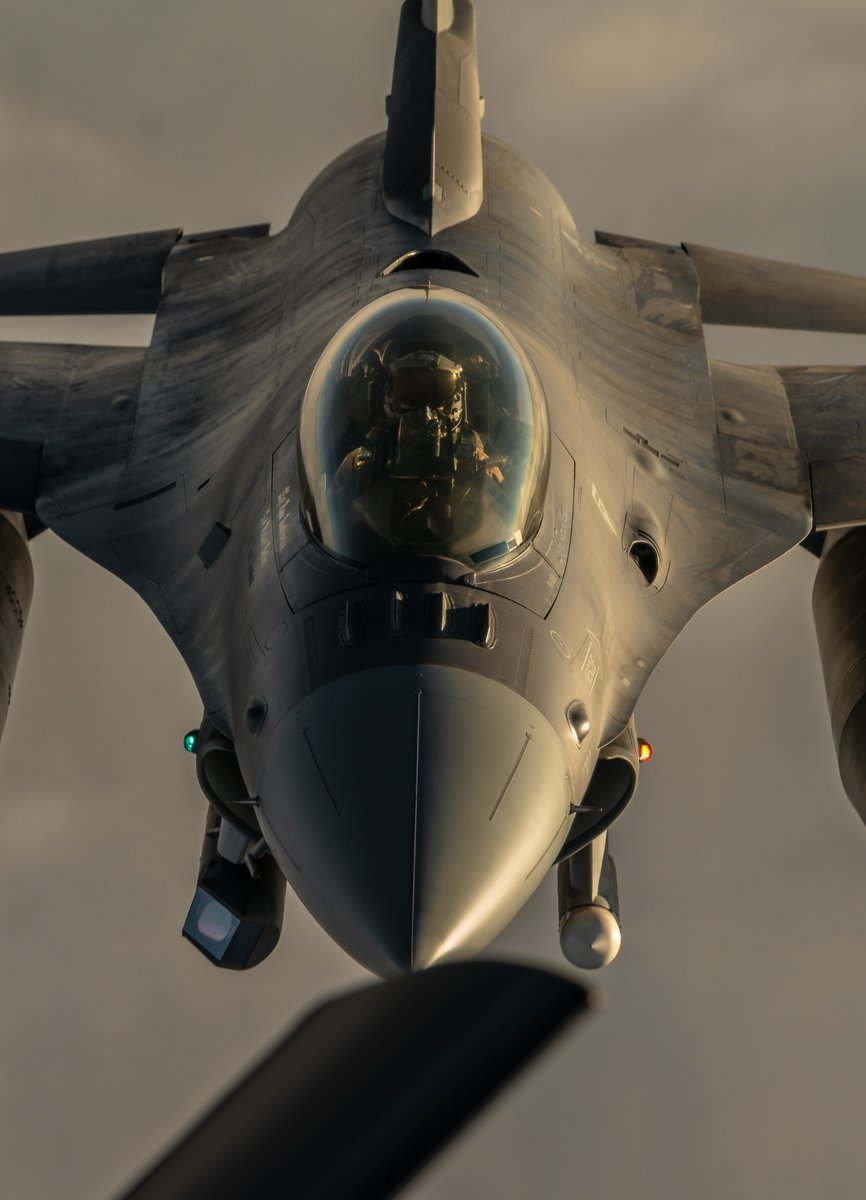 A U.S. Air Force F-16 Fighting Falcon prepares to receive fuel from a U.S. Air Force KC-135 Stratotanker, assigned to the 50th Expeditionary Aircraft Refueling Squadron, during an air refueling mission over Southwest Asia, Dec. 22, 2020.