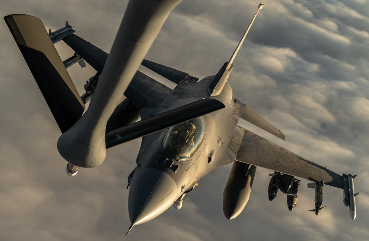 A U.S. Air Force F-16 Fighting Falcon prepares to receive fuel from a U.S. Air Force KC-135 Stratotanker, assigned to the 50th Expeditionary Aircraft Refueling Squadron, during an air refueling mission over Southwest Asia, Dec. 22, 2020.