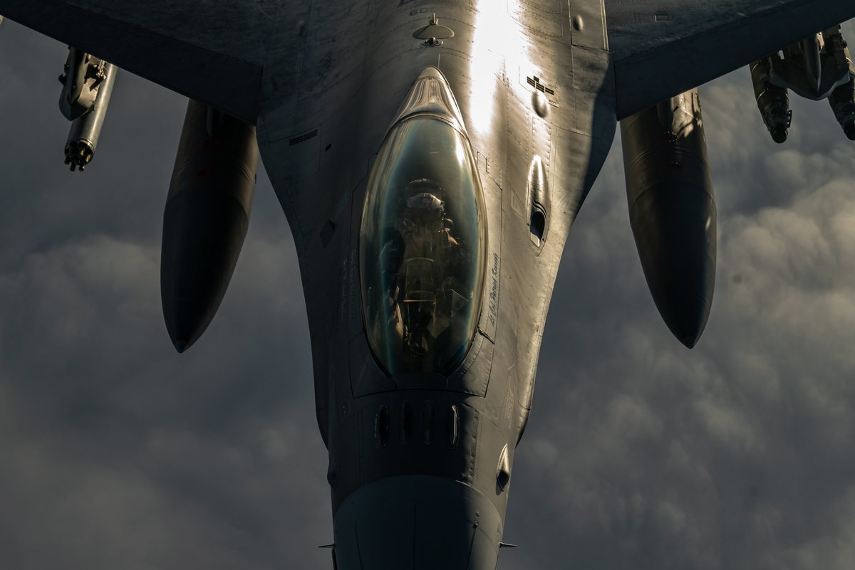 A U.S. Air Force F-16 Fighting Falcon receives fuel from a U.S. Air Force KC-135 Stratotanker, assigned to the 50th Expeditionary Aircraft Refueling Squadron, during an air refueling mission over Southwest Asia, Dec. 22, 2020.