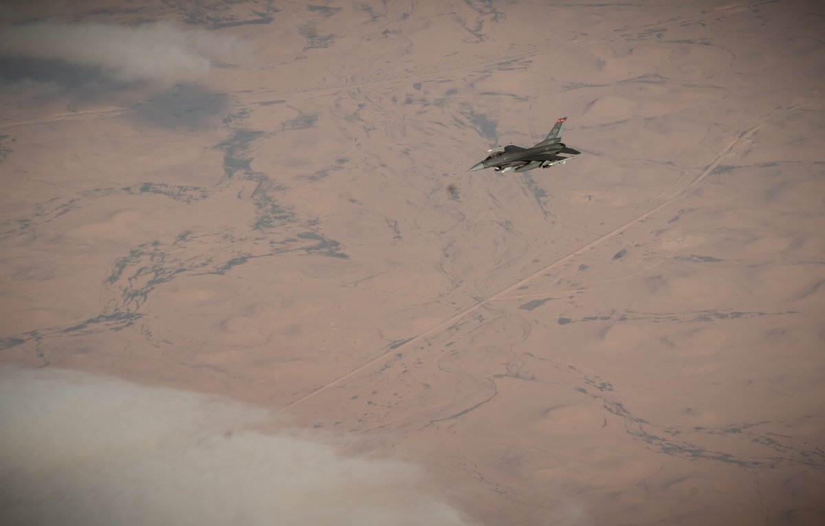 A U.S. Air Force F-16 Fighting Falcon departs after receiving fuel from a U.S. Air Force KC-135 Stratotanker, assigned to the 50th Expeditionary Aircraft Refueling Squadron, during an air refueling mission over Southwest Asia, Dec. 22, 2020.