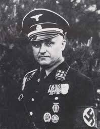 Karl-Otto Koch, an SS officer who was commandant at Buchenwald and later Majdanek, was executed before a Nazi firing squad on 5 April 1945 after being found guilty of corruption and—strange as it sounds for a Nazi concentration- and extermination-camp guard—murder. <Thread>