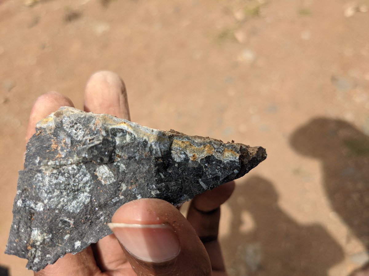 we back.the area is covered by mt kenya black volcanics that weather to the fertile red soil that we survive on.on pic 1 look at how it turns from black to reddish white...