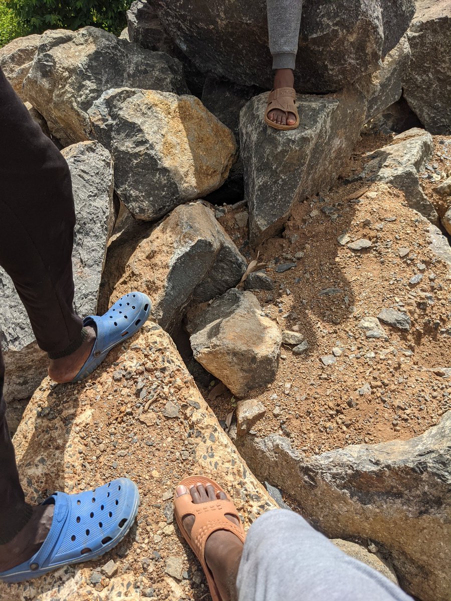 the black rock im holding is from the red rock nahuko. that's why it's important to have a fresh sample using a rock hammer.but as you can tell from our footwear that we don't have the correct tools to get a sample.