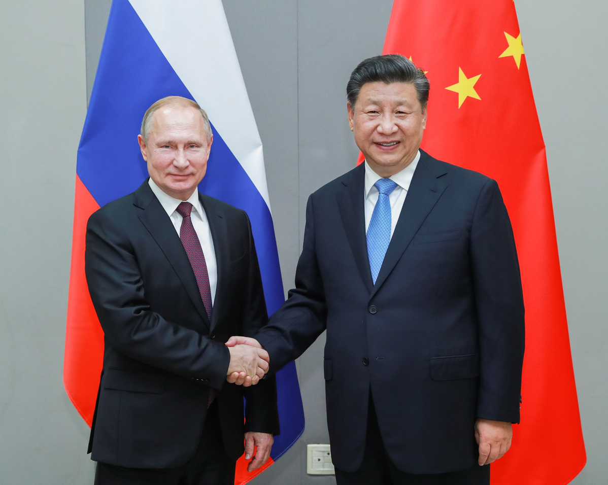 PDChina's tweet photo. Chinese President Xi Jinping and Russian President Vladimir Putin spoke over phone on Monday and exchanged good wishes for the New Year. https://t.co/2SB0XyJfaG