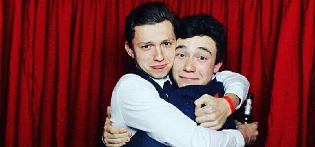 tom holland hugging people: a thread