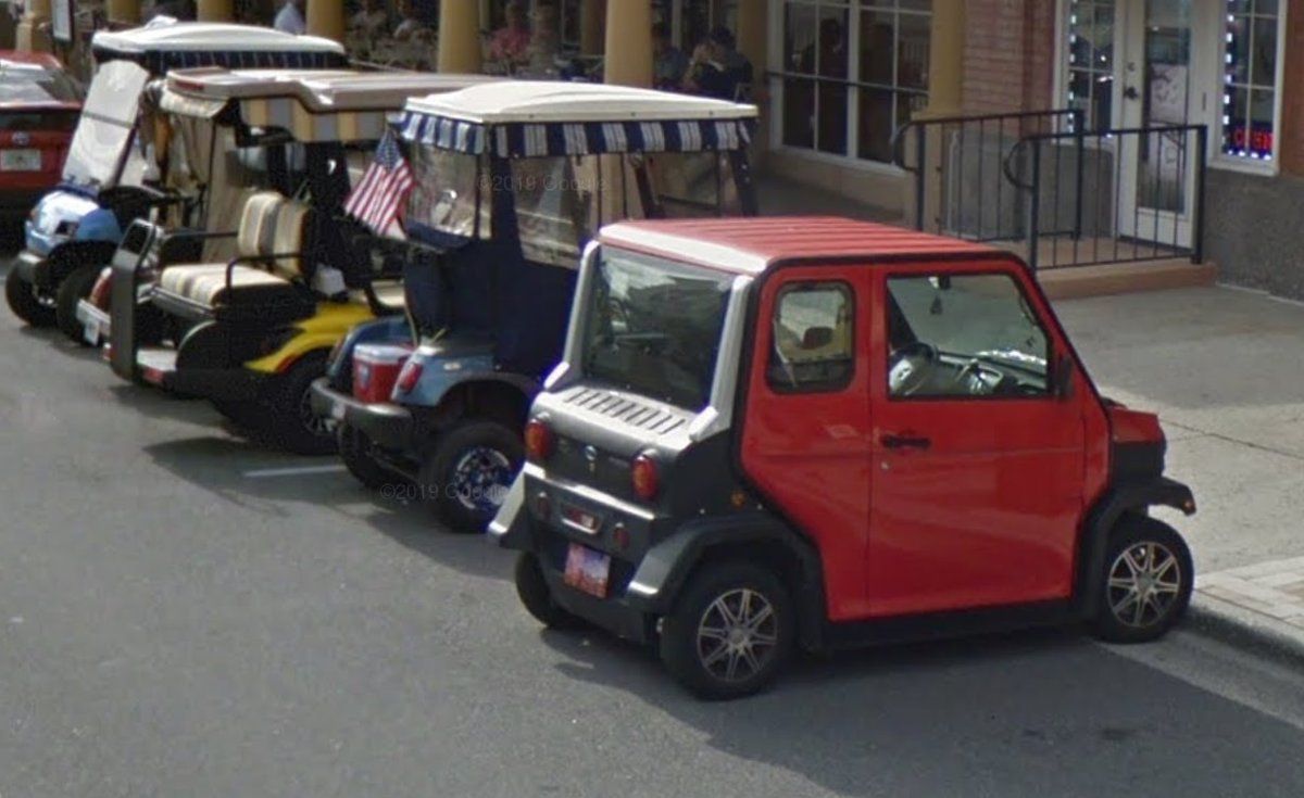 Exploring the area shows golf carts with a wide array of modifications -- from cabin enclosures to sports fan themes -- but also other light electric vehicles not designed around golfing at all. The colors and styling are far more varied than in most standard automobiles.