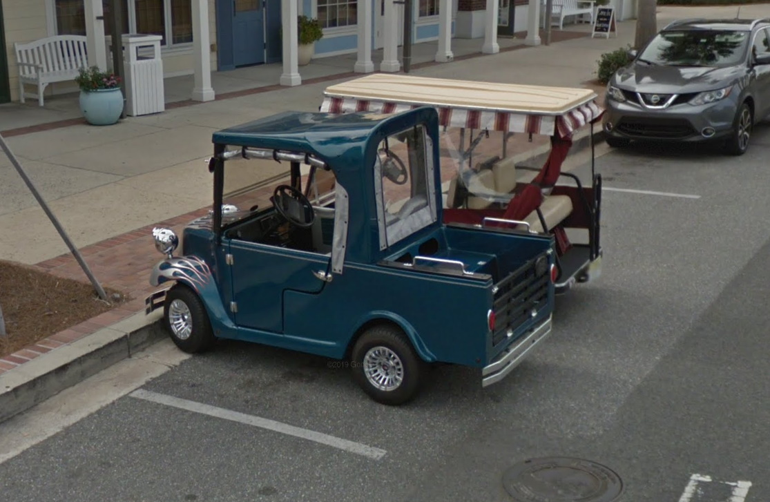 Exploring the area shows golf carts with a wide array of modifications -- from cabin enclosures to sports fan themes -- but also other light electric vehicles not designed around golfing at all. The colors and styling are far more varied than in most standard automobiles.