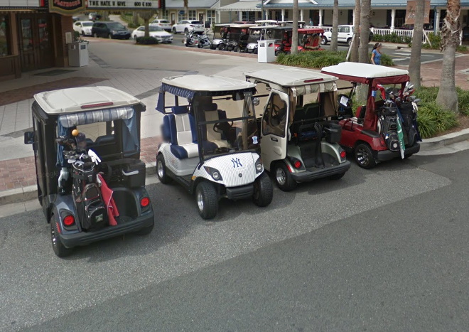 Exploring the area shows golf carts with a wide array of modifications -- from cabin enclosures to sports fan themes -- but also other light electric vehicles not designed around golfing at all. The colors and styling are far more varied than in most standard automobiles.