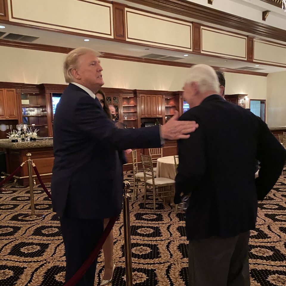 ABC News reached a source who was present in a dining room of about 100 diners who provided a photo of Trump of greeting Stone with a friendly pat on the shoulder. 7/7