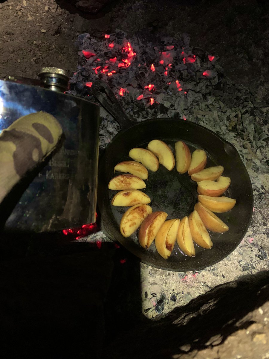 More campfire bougie: bourbon-sautéed apples on the cast iron & right on the coals.