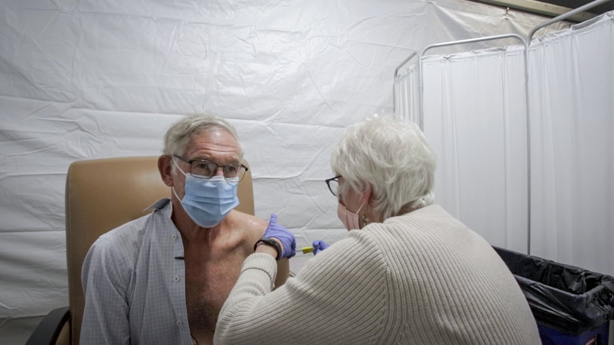 Dr. Larry Corey receives the COVID-19 Pfizer vaccination, December 24, 2020 at the Seattle Cancer Care Alliance. Corey was asked by Dr. Anthony Fauci several months ago to coordinate the national vaccine trials effort. bit.ly/2JoISVl