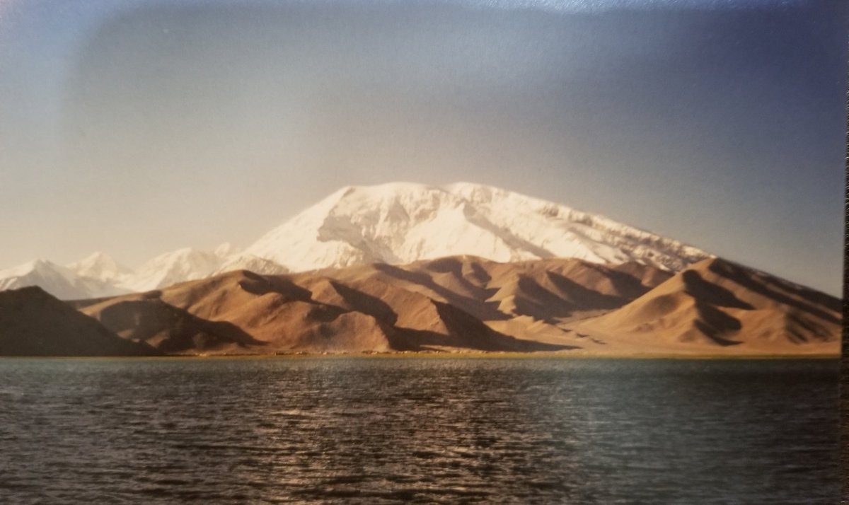 I miss travelling (22): camping and hiking at the base of the Muztagh Ata, in southwest Xinjiang. The lake is at an altitude of about 3,500 metres; the mountain at 7,500m. One of the highlights was yak milk tea and bread for breakfast....