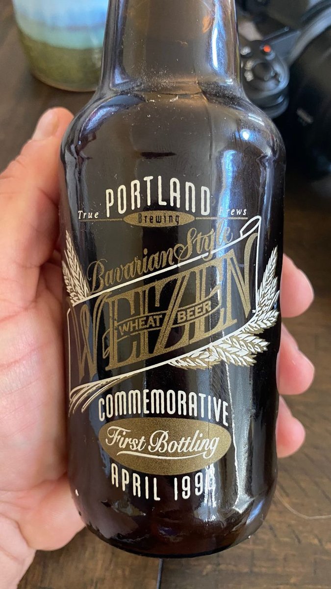 A fan just sent us this picture - 26 year old bottle of our Bavarian Style Wheat Beer. It's still full! Think they should open it, or save it?