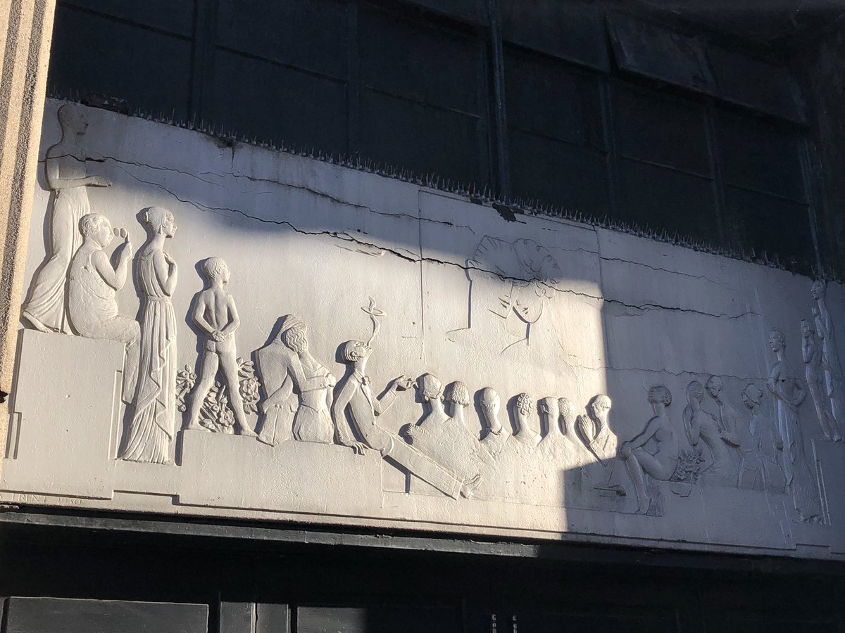 The Apollo Victoria, built as an Art Deco cinema and now used as a stage theatre for the musical Wicked. Including this lovely relief detail hinting at its former purpose – bei  Apollo Victoria Theatre