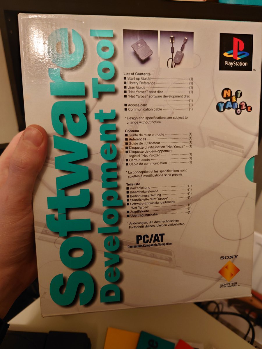 The box contained a special black PS1 dev console, a Net Yaroze access card (required to put it into dev mode), a boot disc for the console, a compiler and samples disc for your PC, the serial cable to hook the two together, and three user manuals.